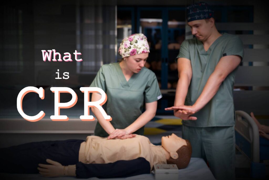 Hands performing CPR on a mannequin.