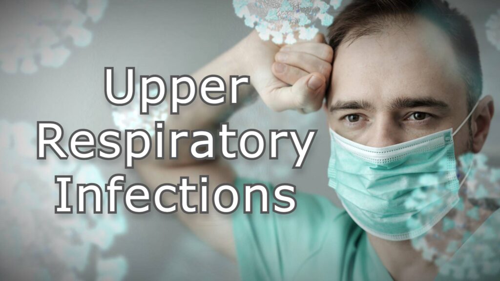 Man wearing a protective mask surrounded by viruses, holding hand to forehead.